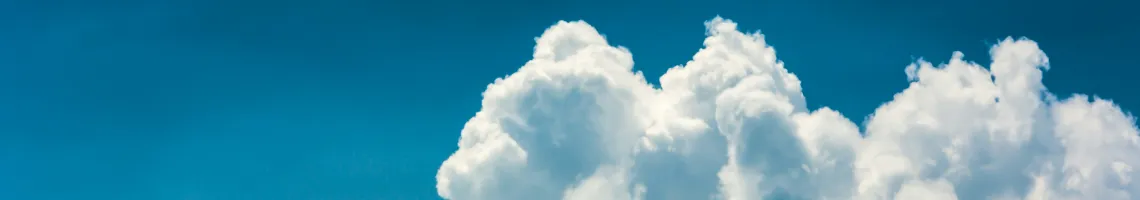 Clouds in a clear blue sky